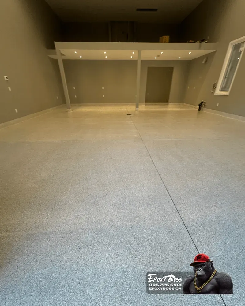 Durable epoxy garage floor with custom flake blend installed in Burlington