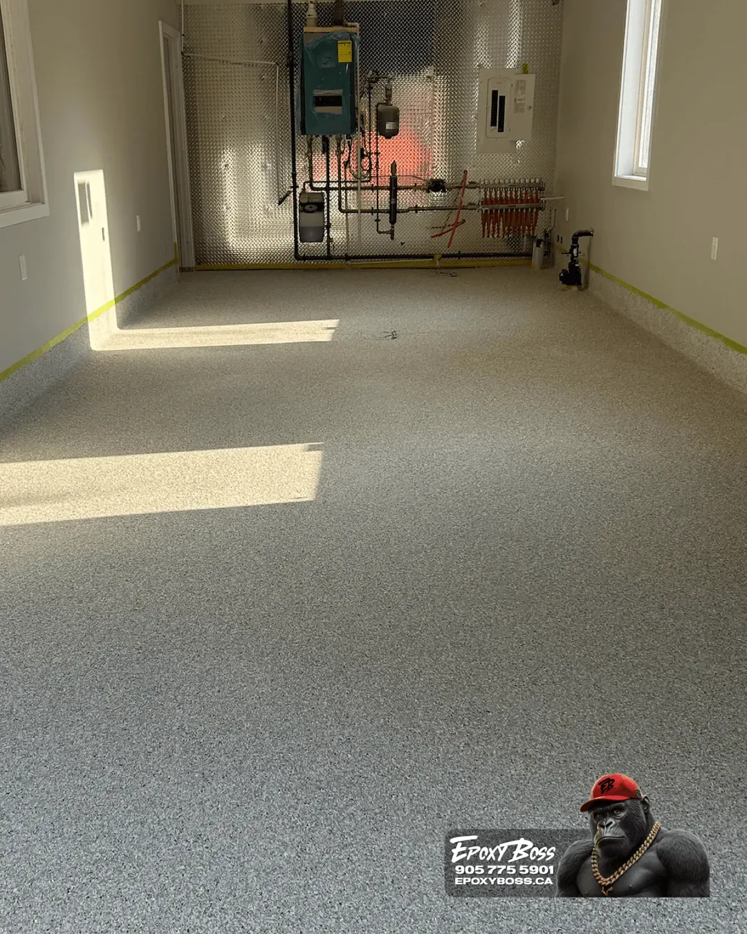 Custom full flake epoxy floor with polyaspartic topcoat in residential garage