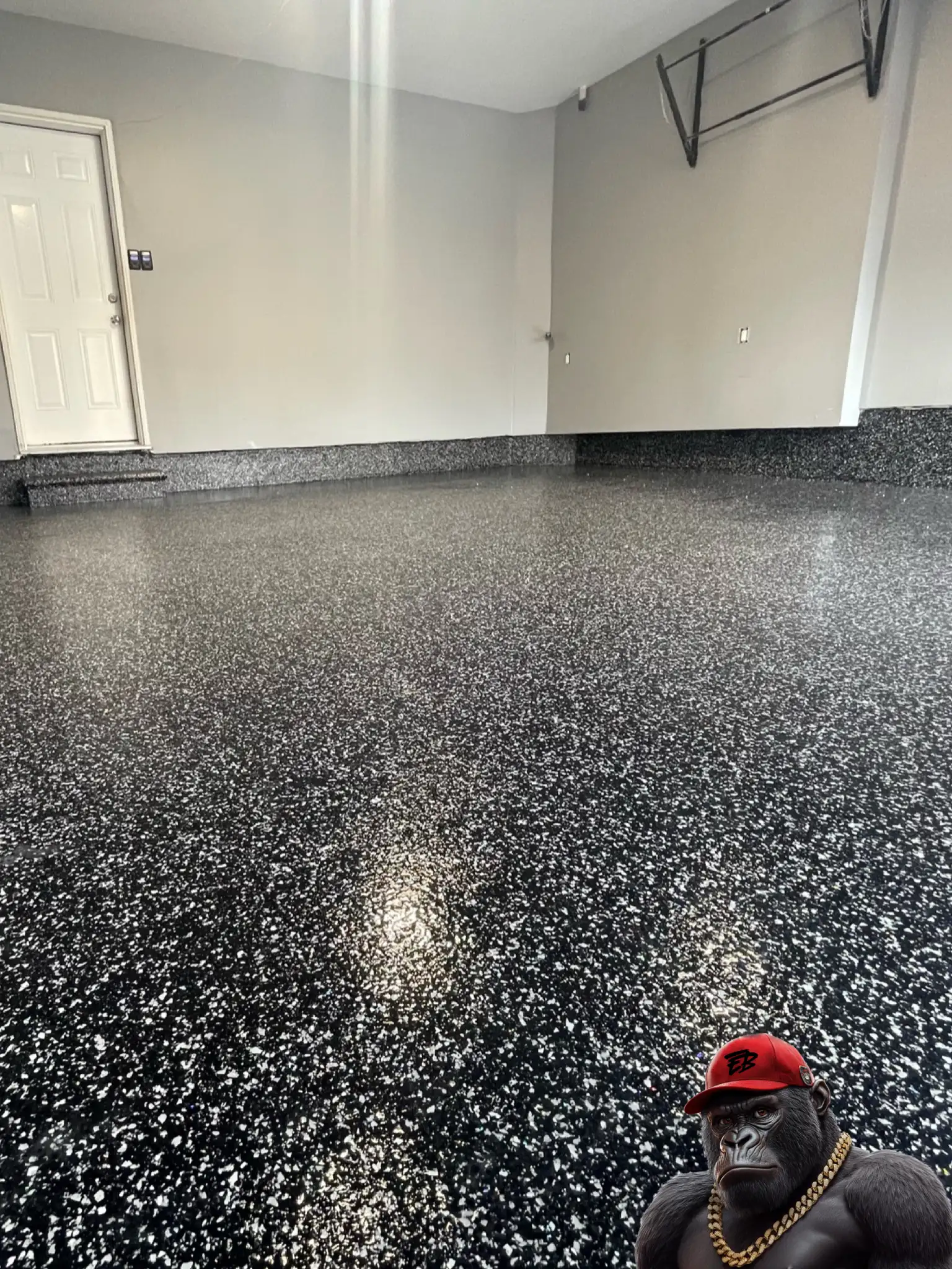 Epoxy flake coating for Barrie residential concrete garage.
