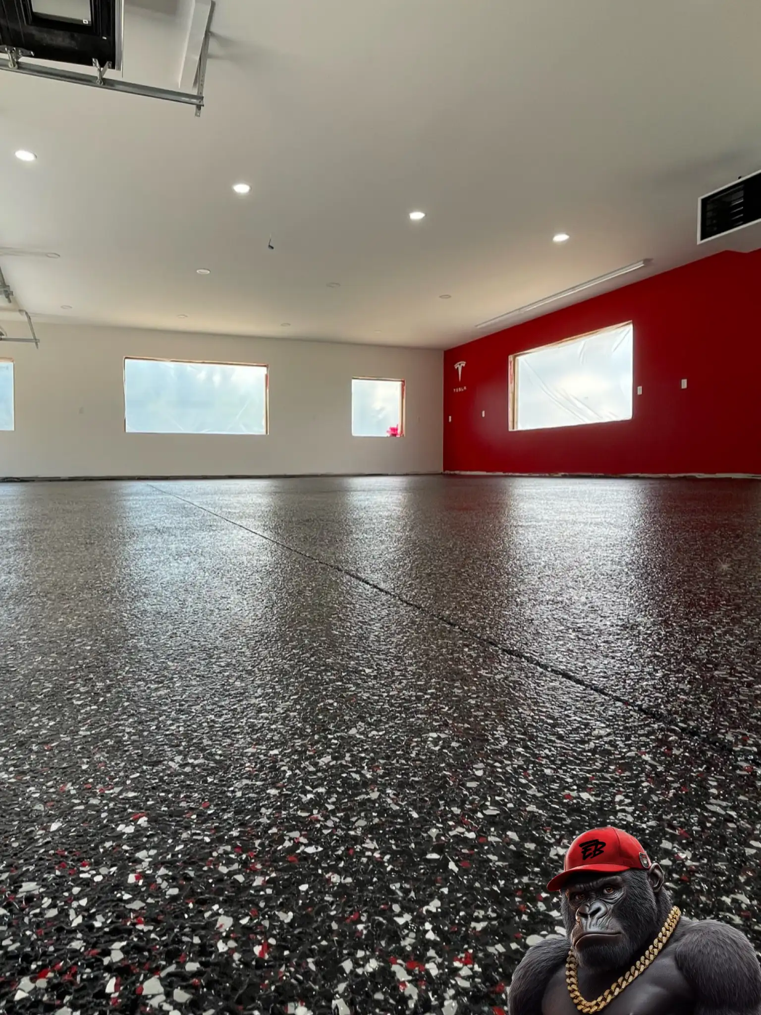 Seamless epoxy garage floor with flakes in Stayner Ontario.