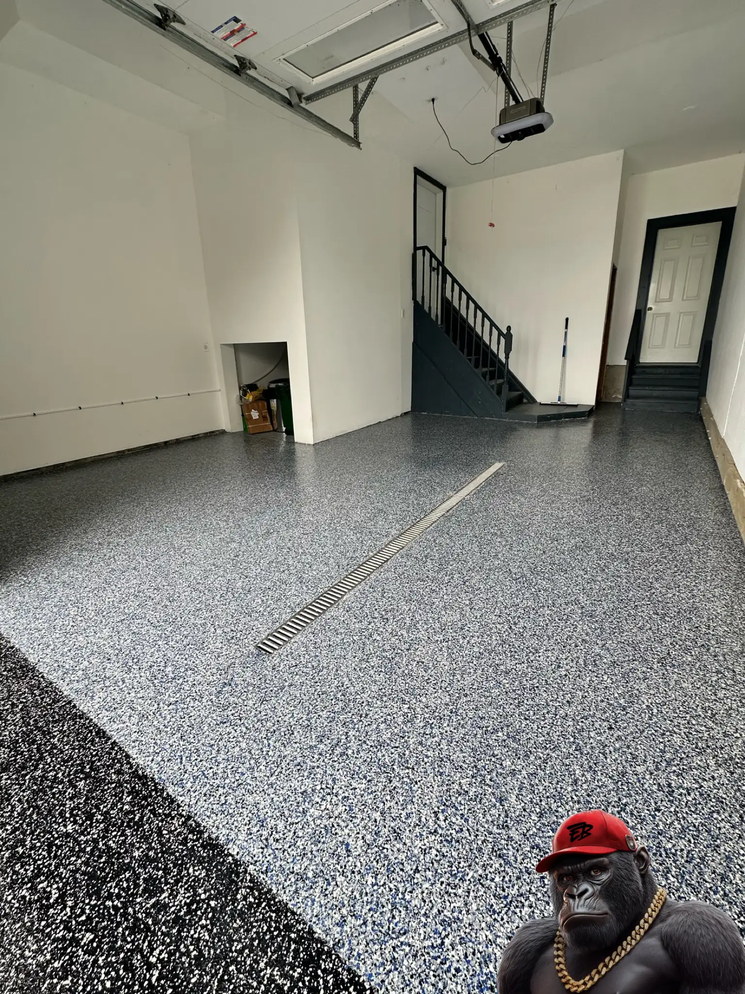 Orillia garage concrete coating finished with decorative flakes.