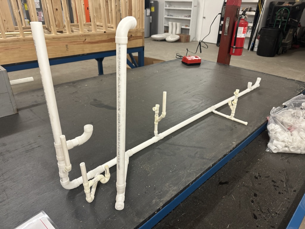 PVC pipe assembly and DWV system training