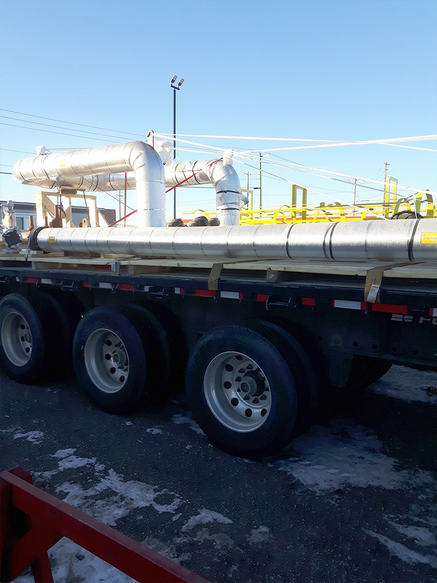 Completed skid with machinery ready for container loading