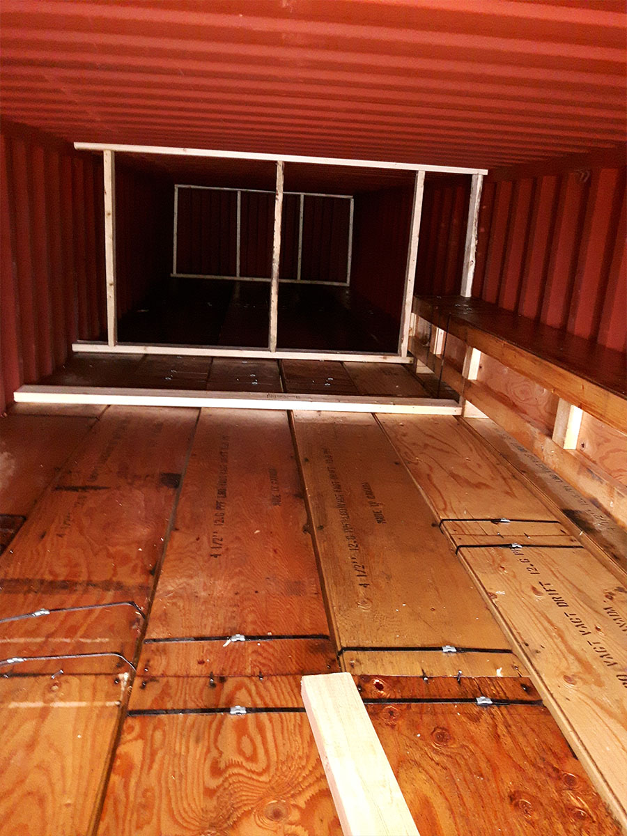 Cargo straps and dunnage bags used to secure load inside container