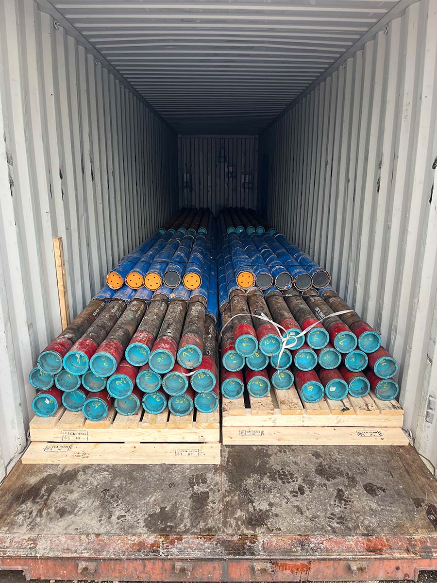 Helicopter loaded and secured inside a shipping container
