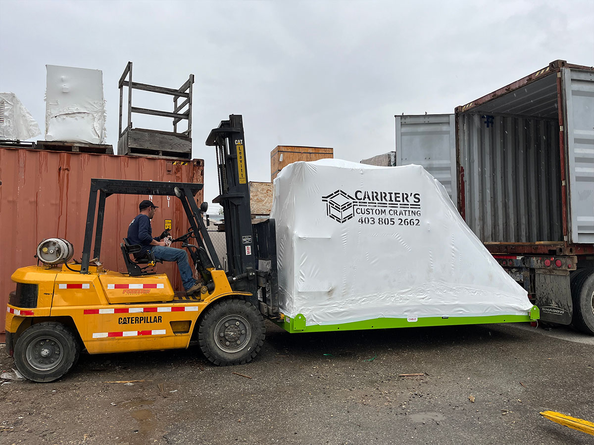 Strapping and bracing applied to equipment inside a shipping container