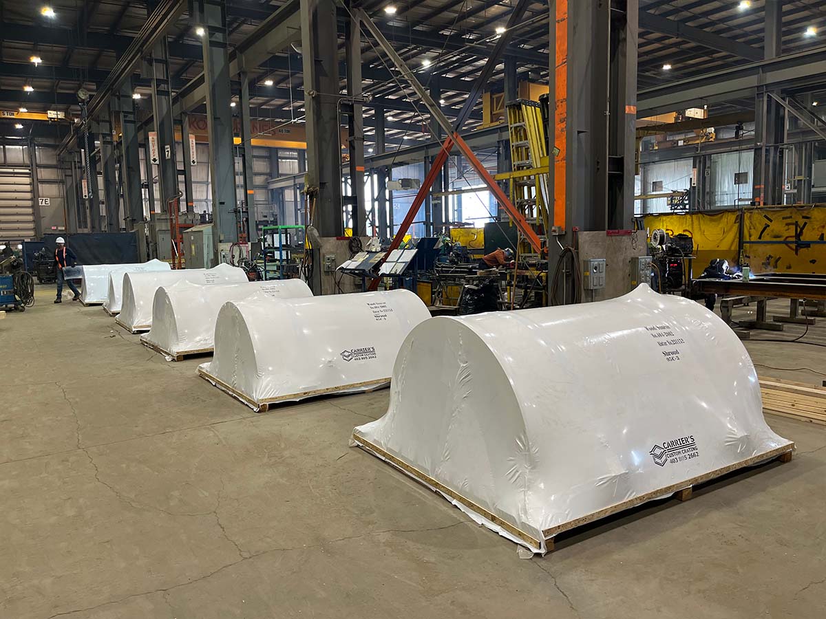 Sealed moisture barrier bag containing industrial equipment for long-term storage