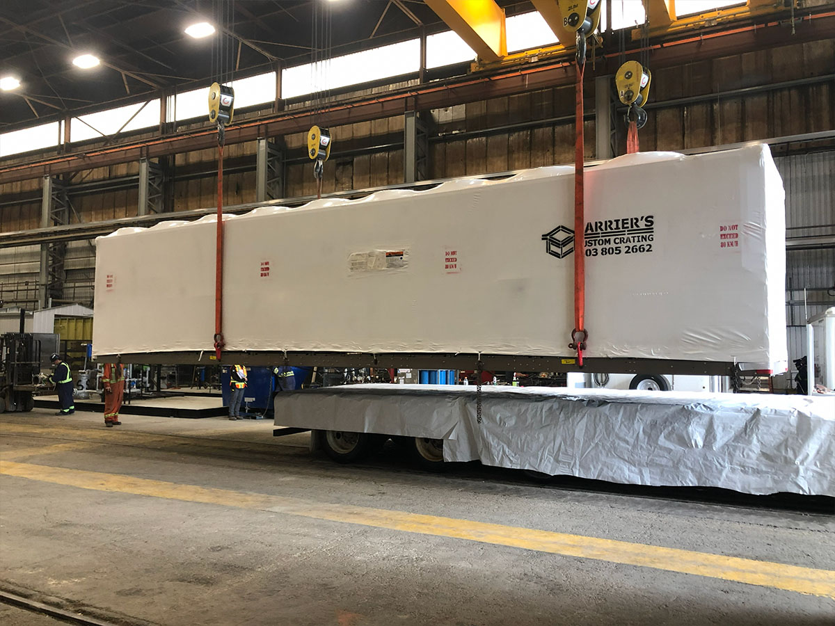 Multiple pieces of equipment wrapped and protected for winter storage