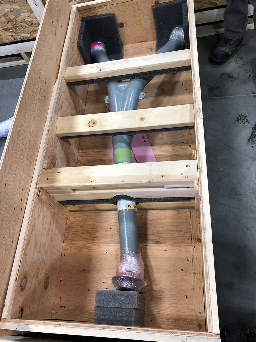 Specialty shipping crate opened at a trade show venue