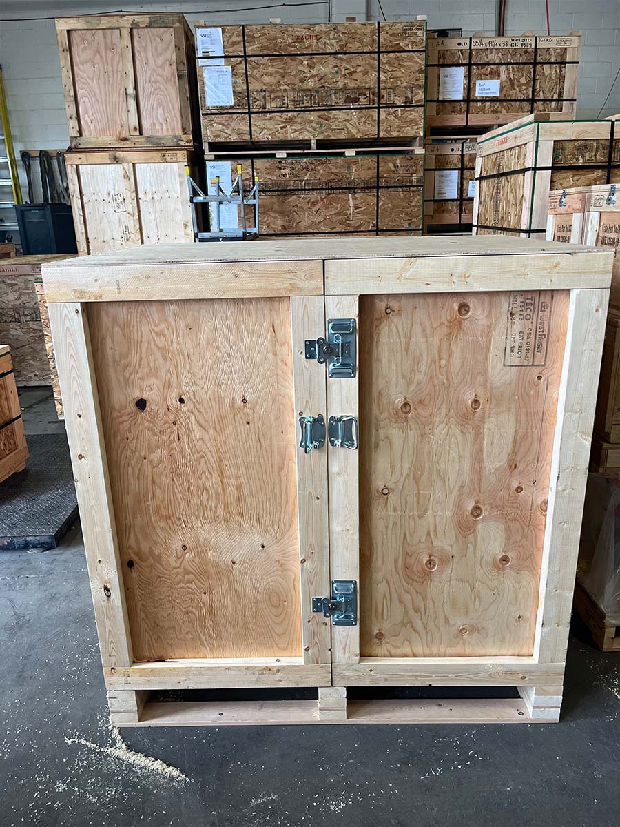 Trade show crate interior with integrated shelves for display components