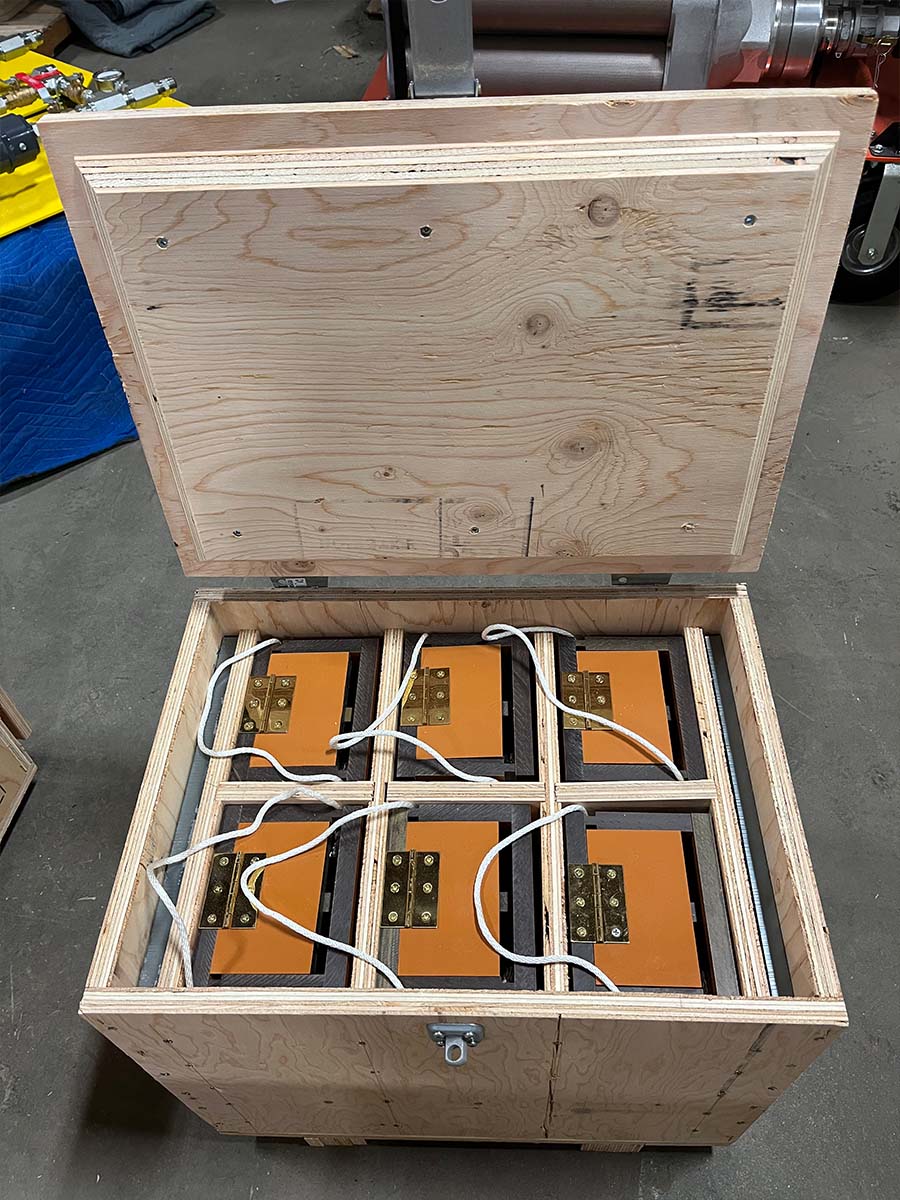 Carriers team finishing a trade show crate for a repeat event client