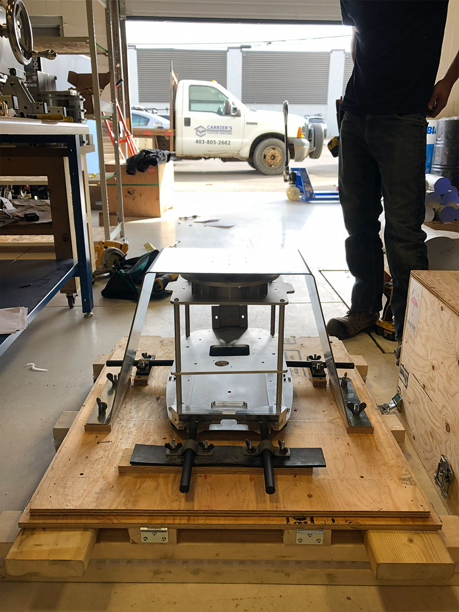 Exhibit crate being loaded onto a truck for transport to next event