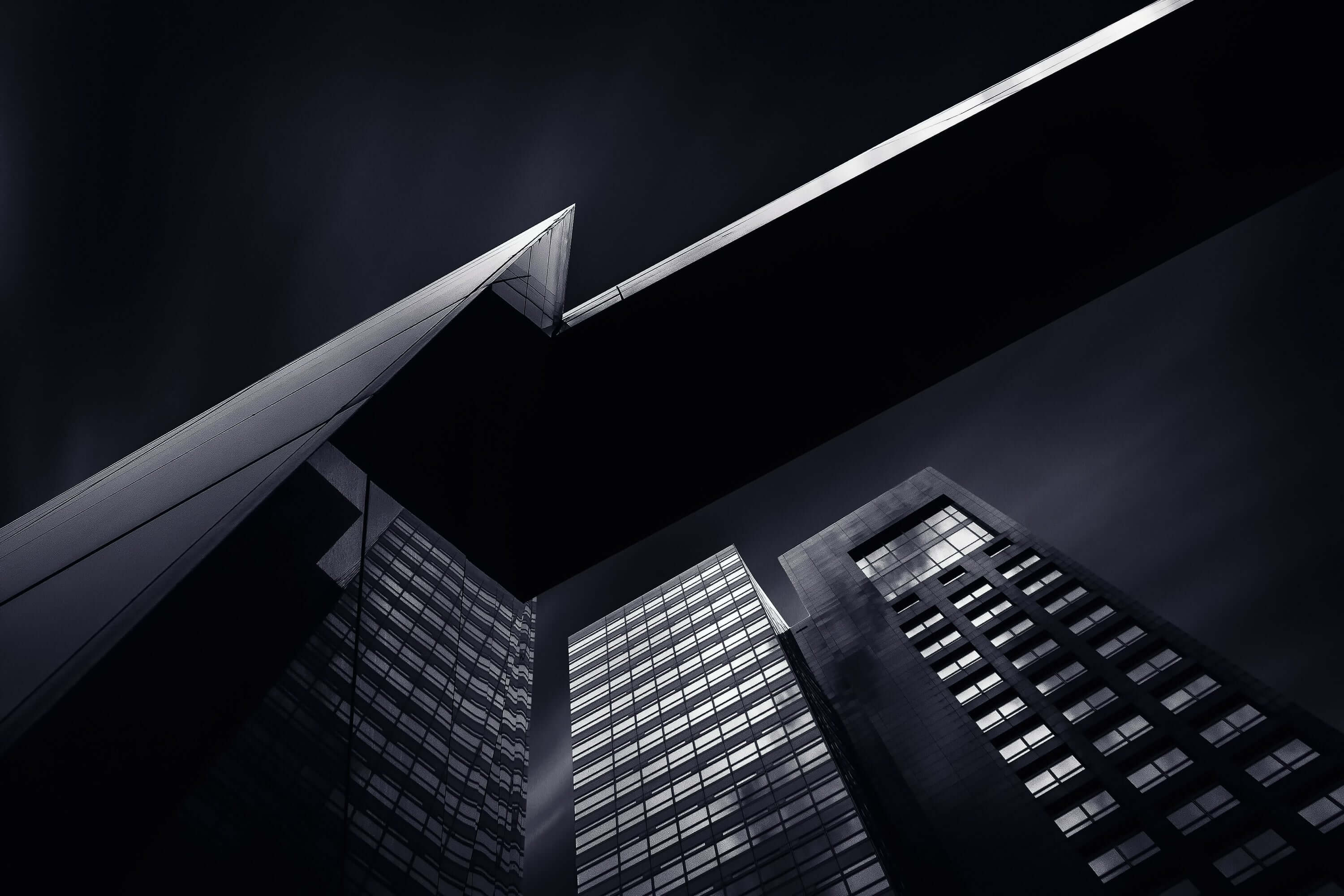 a black and white photo of a tall building