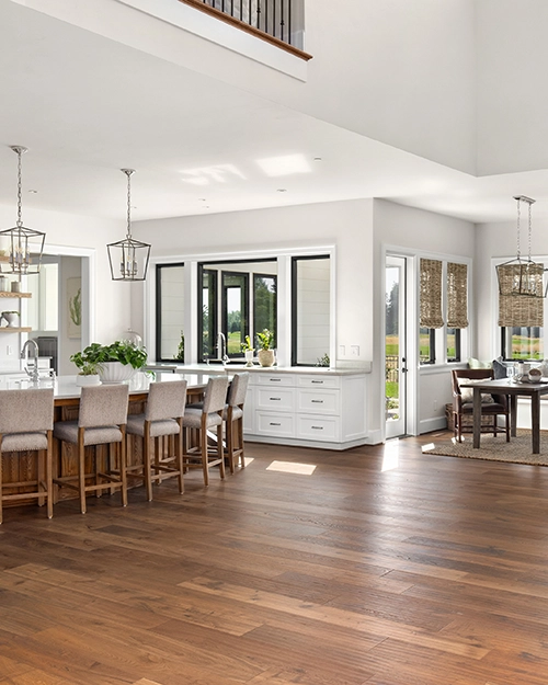 Beautiful hardwood kitchen flooring purchased through All American Discount Flooring