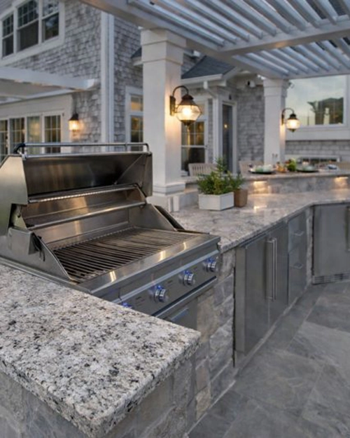Granite countertops in outdoor BBQ area installed by All American Discount Flooring