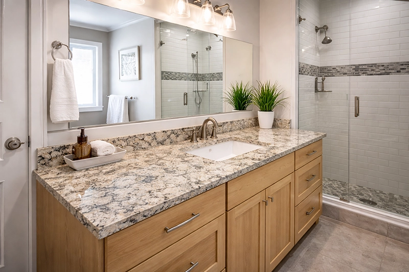 Modern Yakima bathroom with natural granite countertops installed by All American Discount Flooring & Countertops
