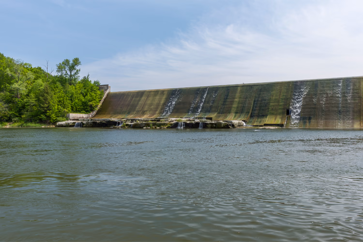 Dam spillway and reservoir used for water storage and catchment management.