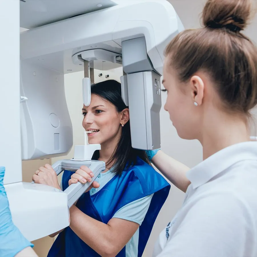 Dr. Sung listening to a patient at the first cosmetic consultation