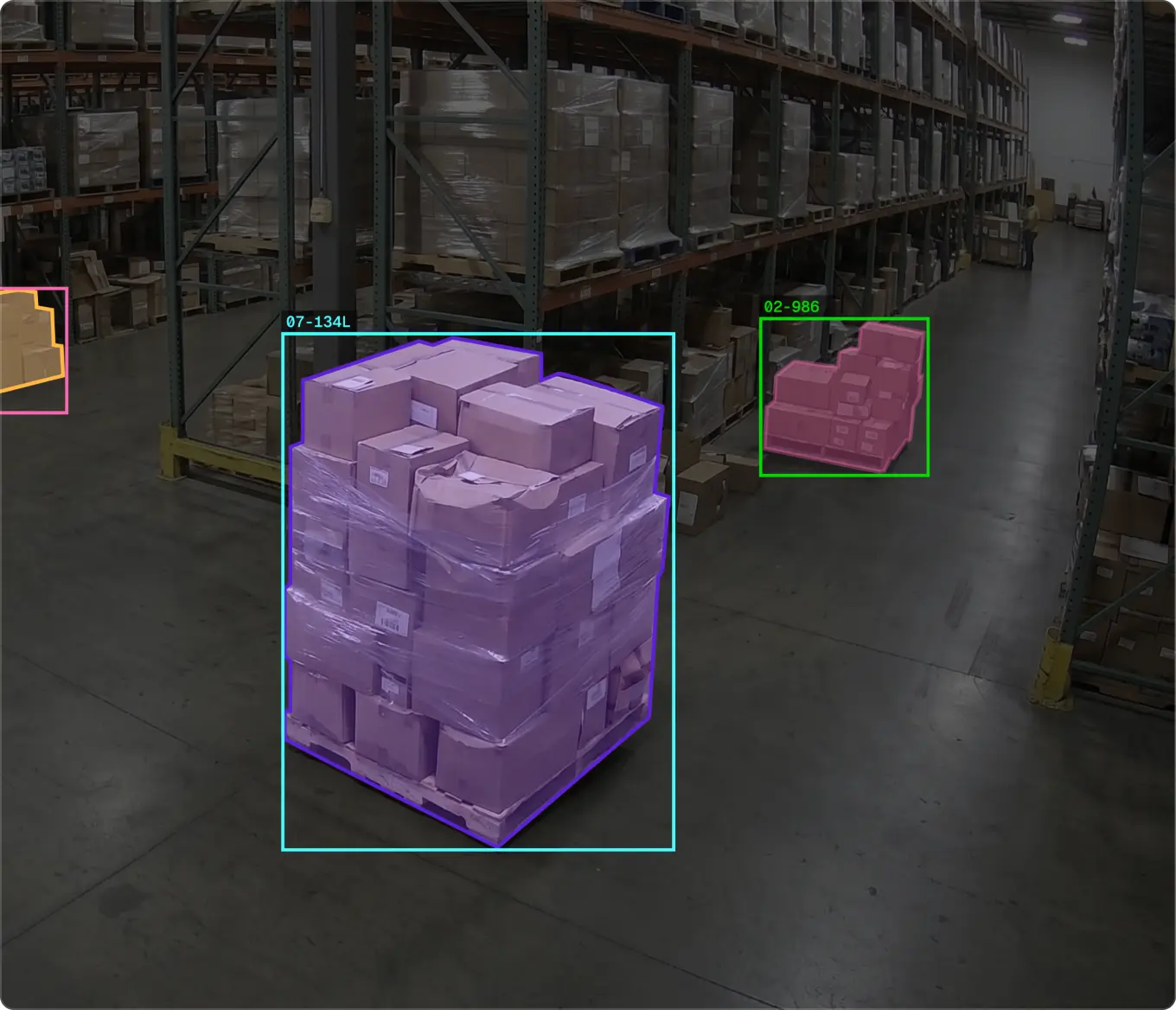 Aerial view of a yellow forklift carrying a pallet of boxes through a warehouse aisle, highlighted with a yellow safety outline to illustrate vehicle and equipment incident detection.