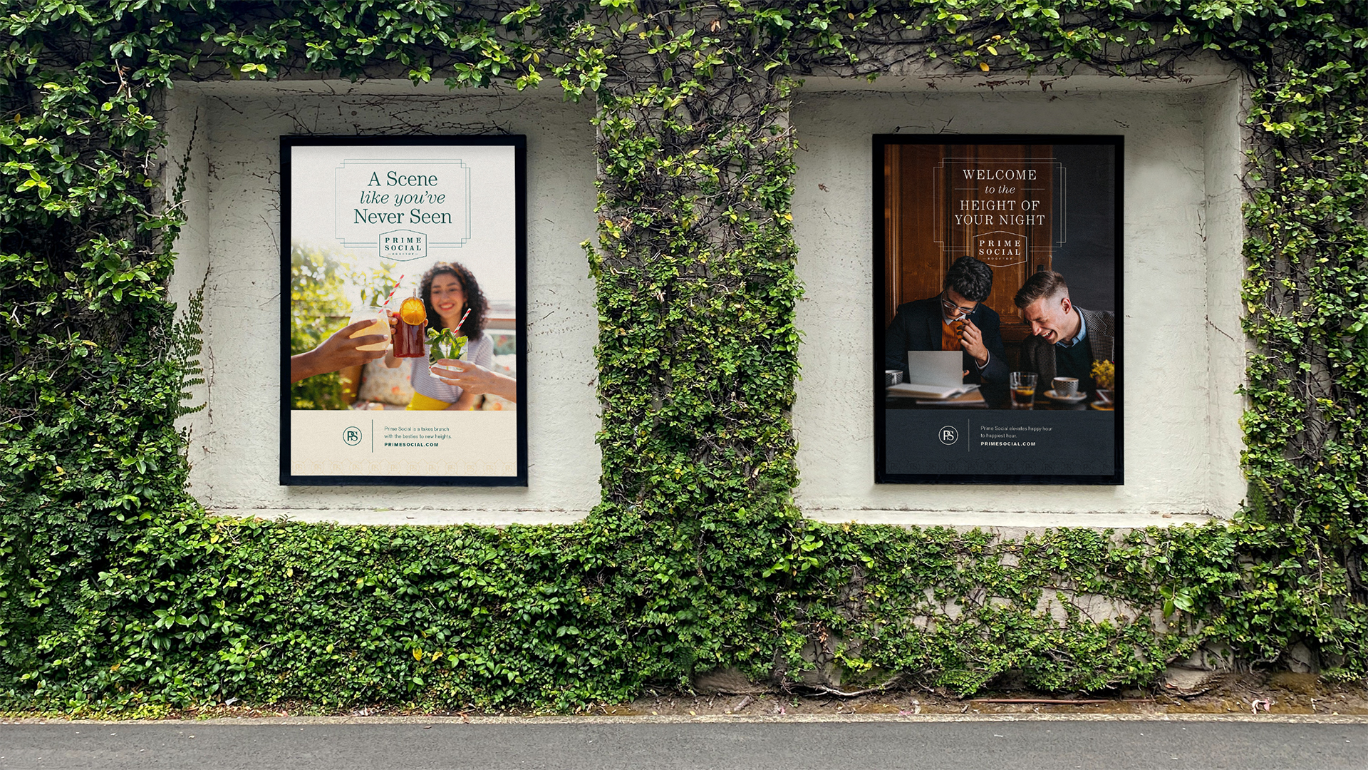 Two outdoor framed posters surrounded by green ivy on a white wall, one depicting a woman with drinks and the other showing two men laughing over coffee.