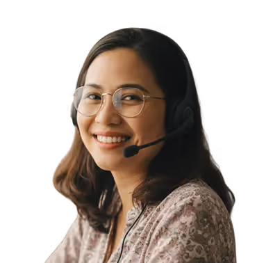 Smiling woman with glasses wearing a headset microphone.