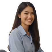Smiling woman with long dark hair wearing a light blue blouse against a white background.