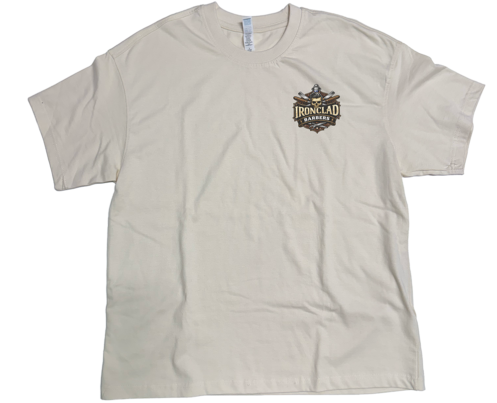 A cream colored shirt with a barber logo on it