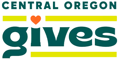 Logo for Central Oregon Gives with the word 'gives' in large letters and a heart above the letter 'i'.