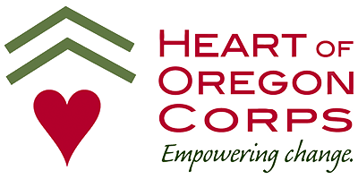Heart of Oregon Corps logo with a green double-chevron above a red heart, and the text 'Heart of Oregon Corps Empowering change.'