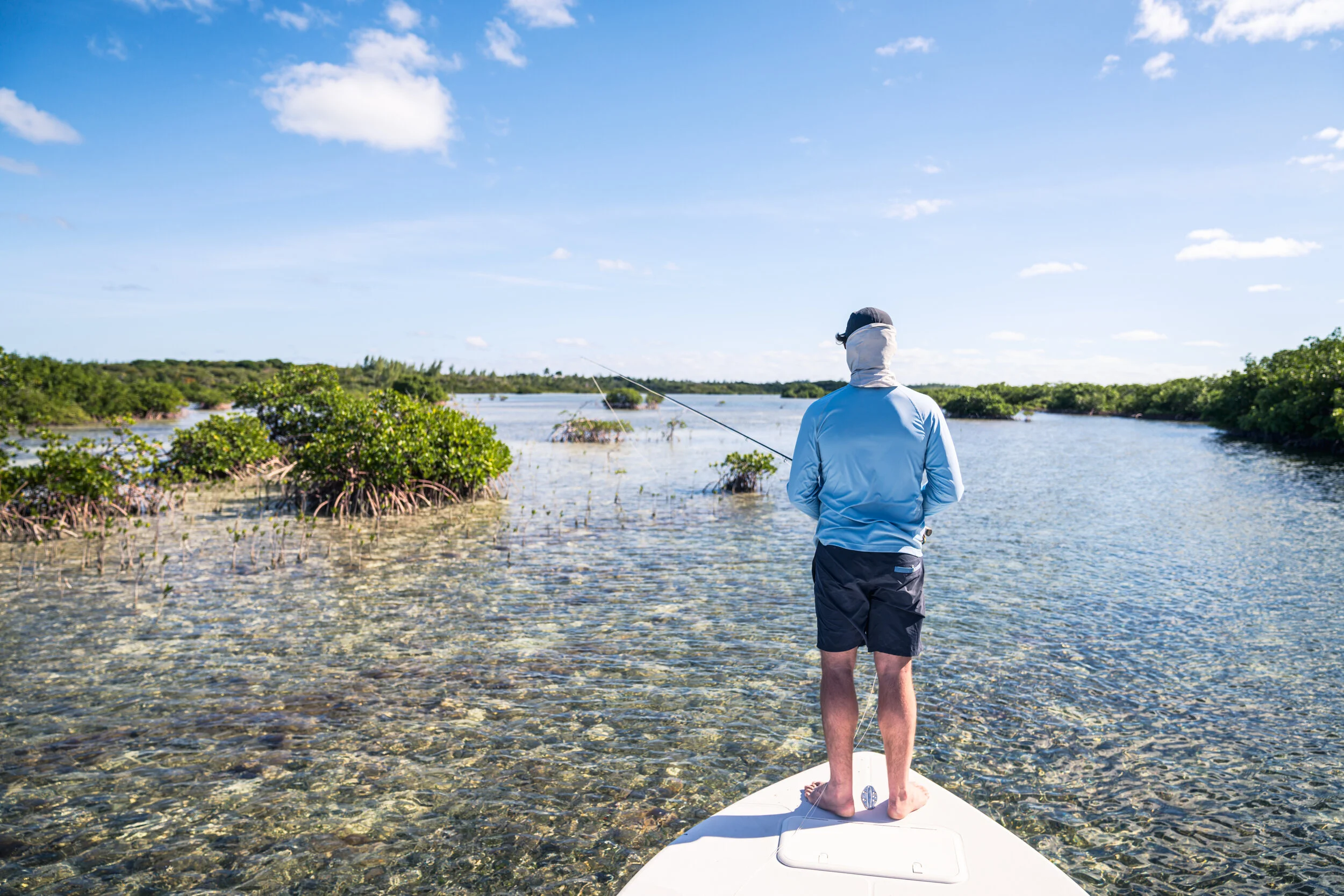 Tracking a bonefish around the edge of a mangrove on Great Harbour Cay.