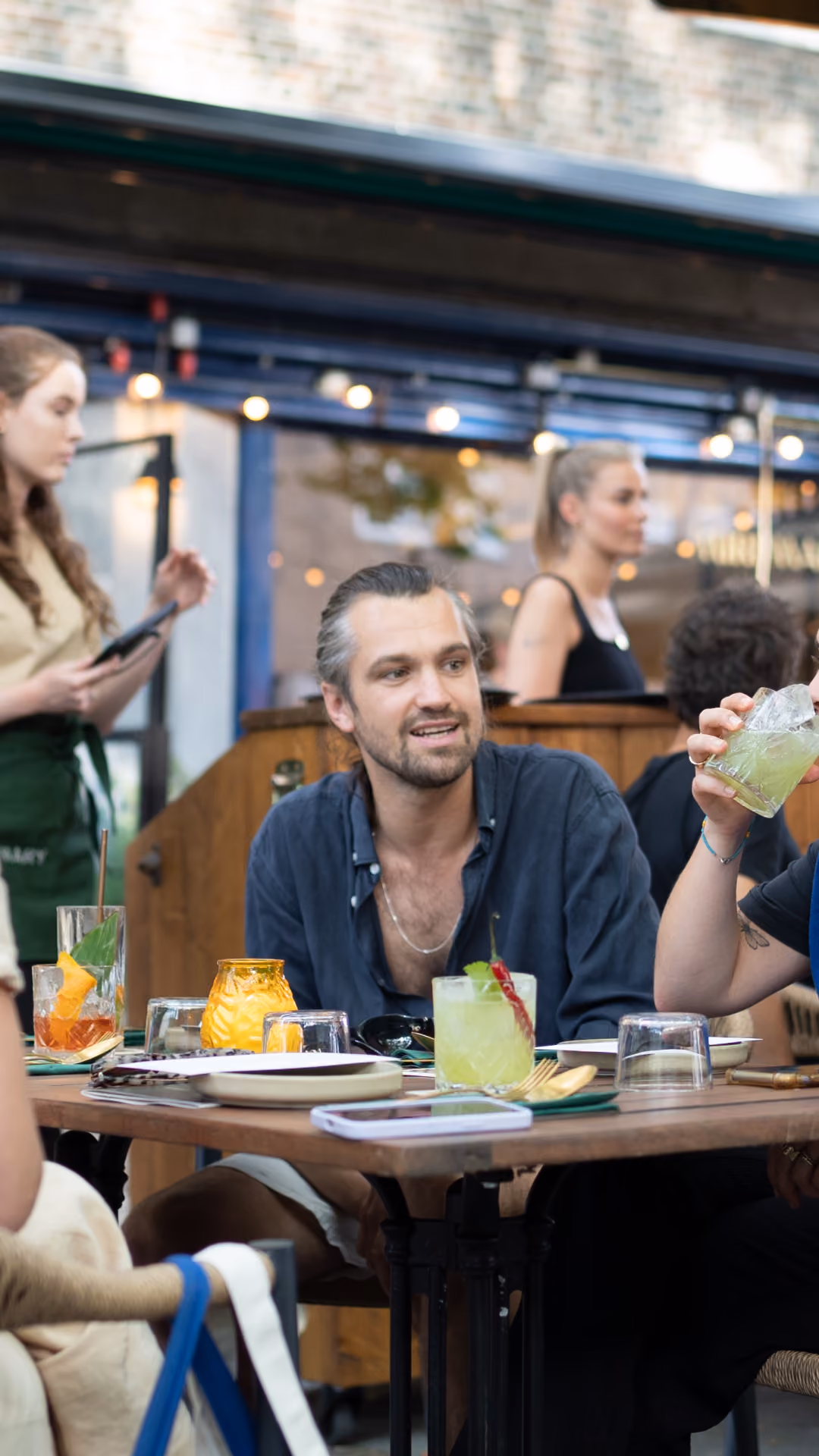 Guests enjoying drinks on the Miri Mary terrace