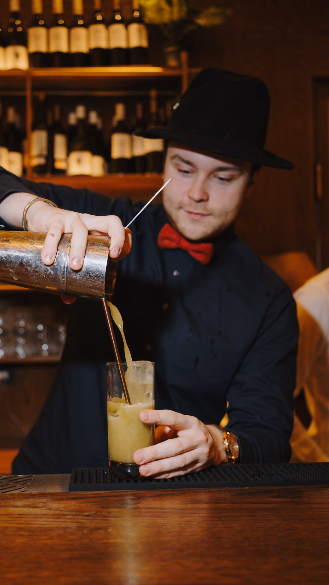 Bartender preparing a cocktail at Miri Mary
