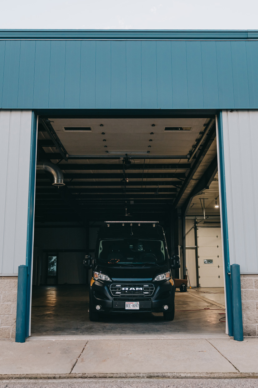 Northwest Rescue ambulance staged in the apparatus bay at the Delavan station