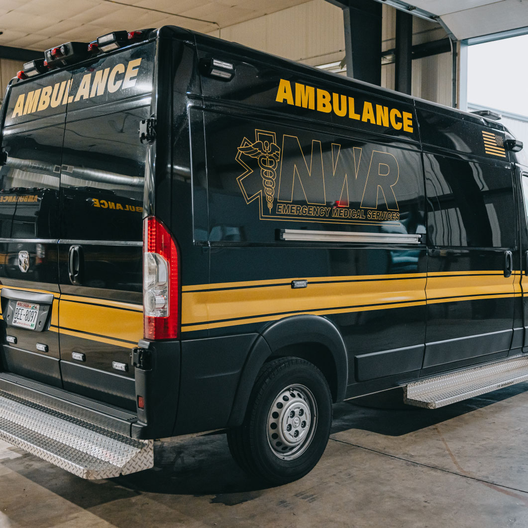 Northwest Rescue NWR Emergency Medical Services ambulance in the bay at the Delavan station