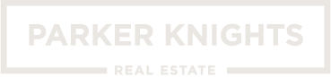 Parker Knights Real Estate logo with name in uppercase letters inside a rectangular border.