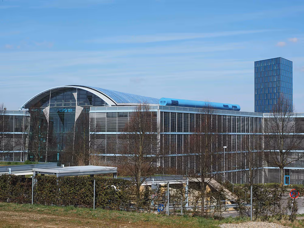 Modern commercial office building lobby with Ubrix intelligent lighting and occupancy-based climate control