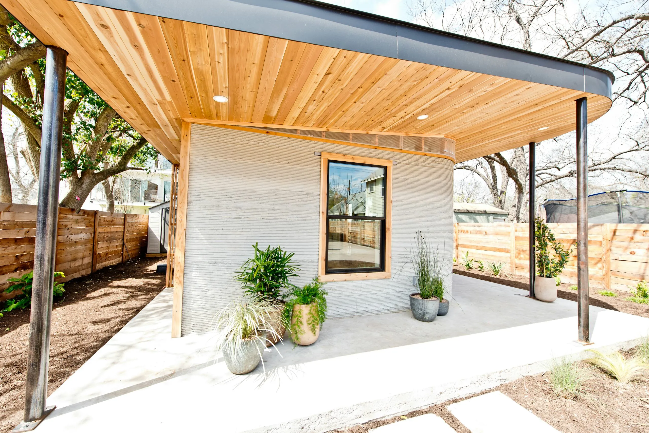 ICON First Permitted 3 D Printed Home side porch Austin TX March2018 Photo Credit Regan Morton Photography