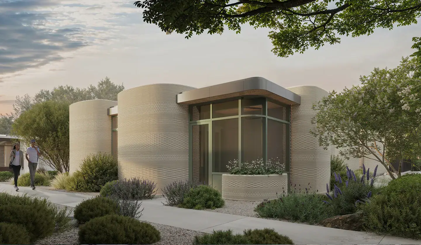 Modern residential building with rounded 3D-printed concrete walls and landscaping