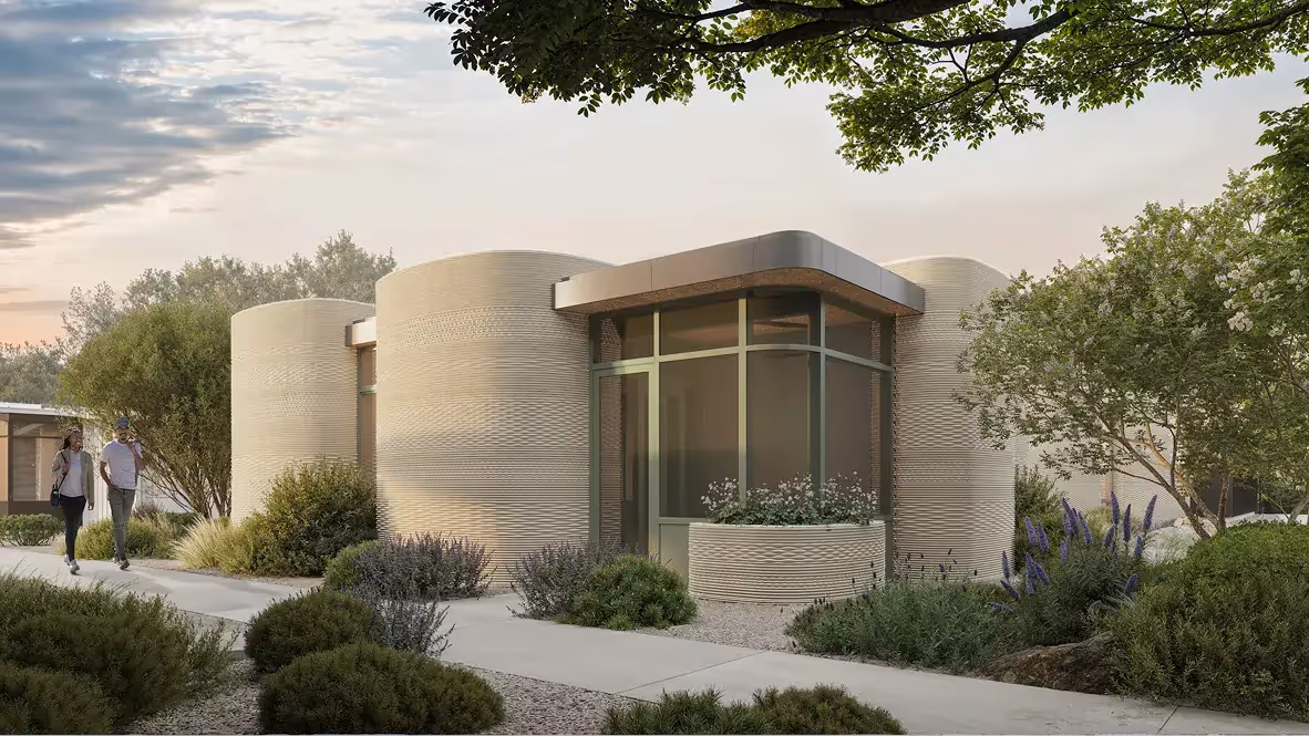 Modern single-story house with curved textured walls, corner glass window, walkway and landscaping