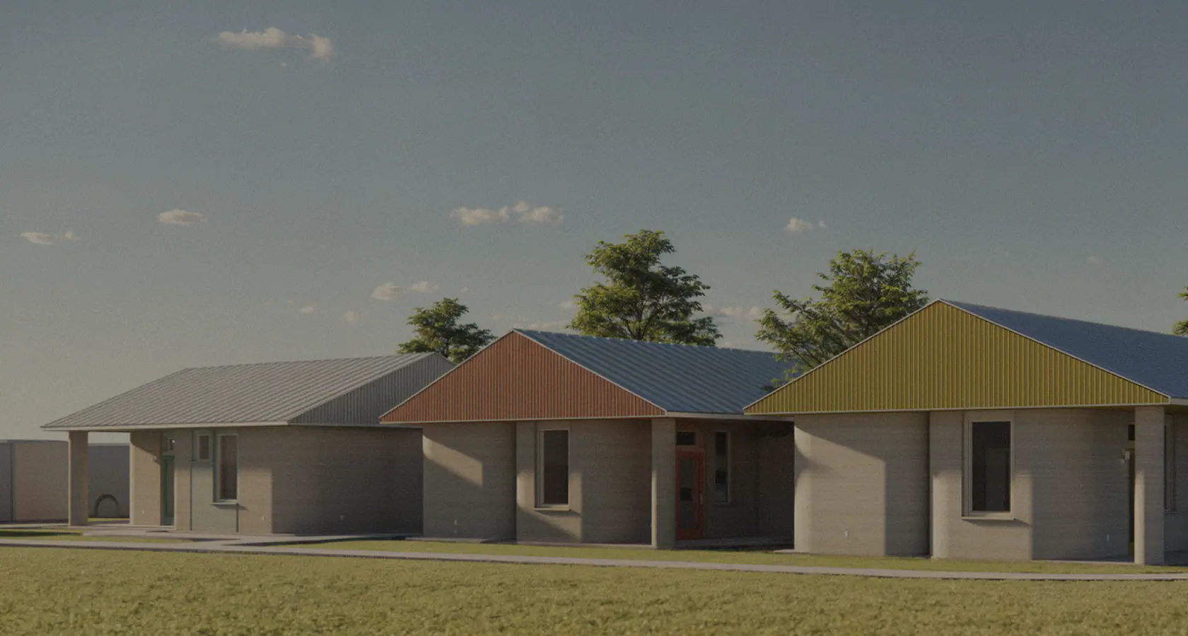 Row of three single-story modern homes with colored metal roofs and trees