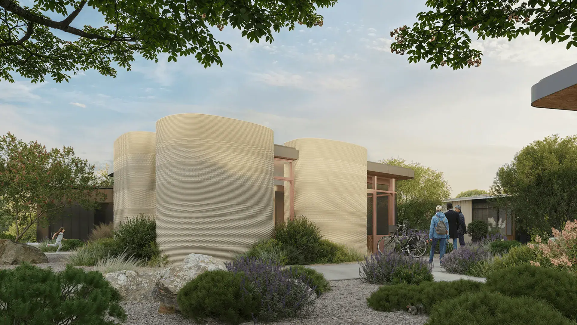 3D-printed cylindrical home exterior with landscaping and people at entrance