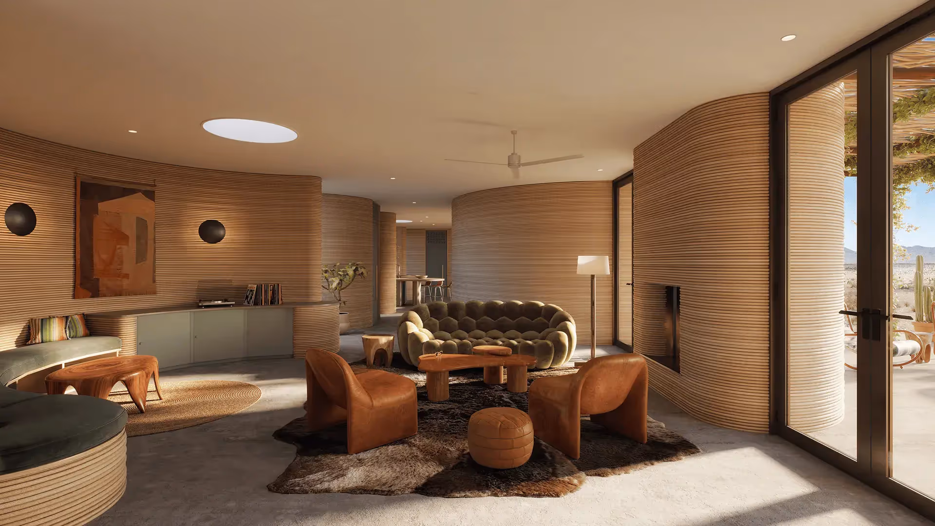 Curved living room with ribbed walls, tufted green sofa, leather chairs, wooden tables, and large windows