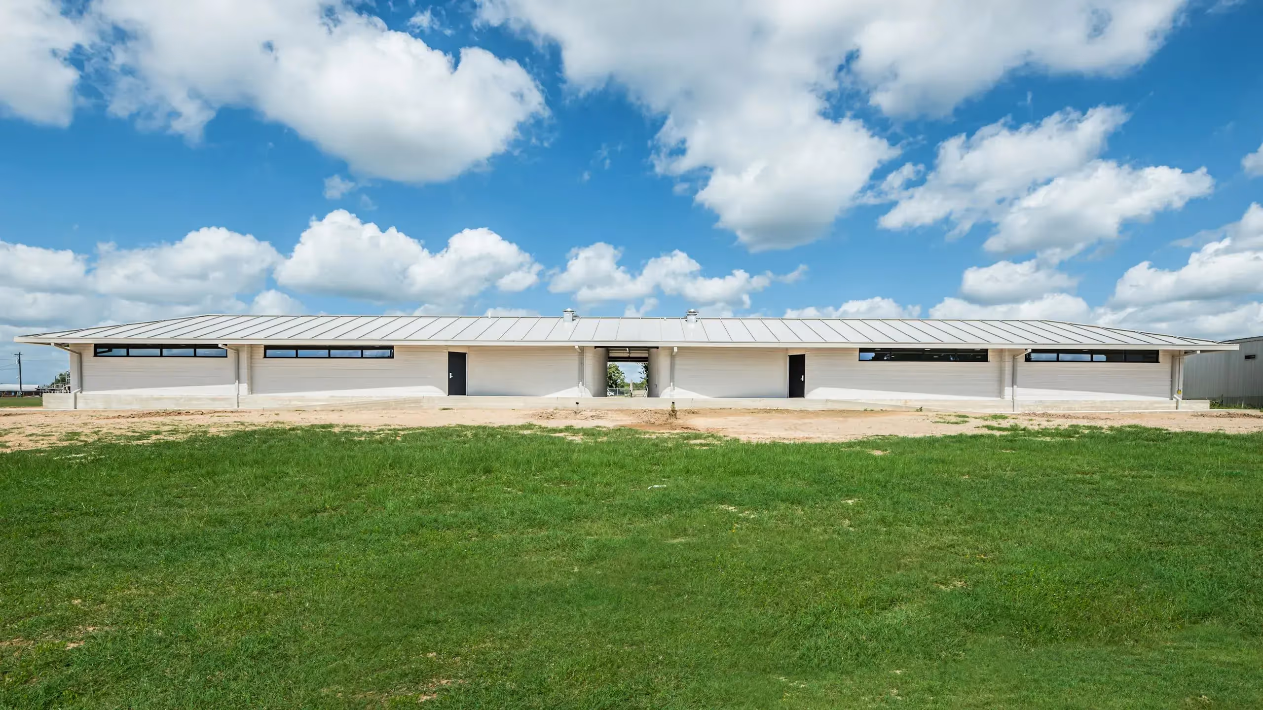 ICON 3 D printed Barracks Designed by Logan Architecture Camp Swift Texas 2021 