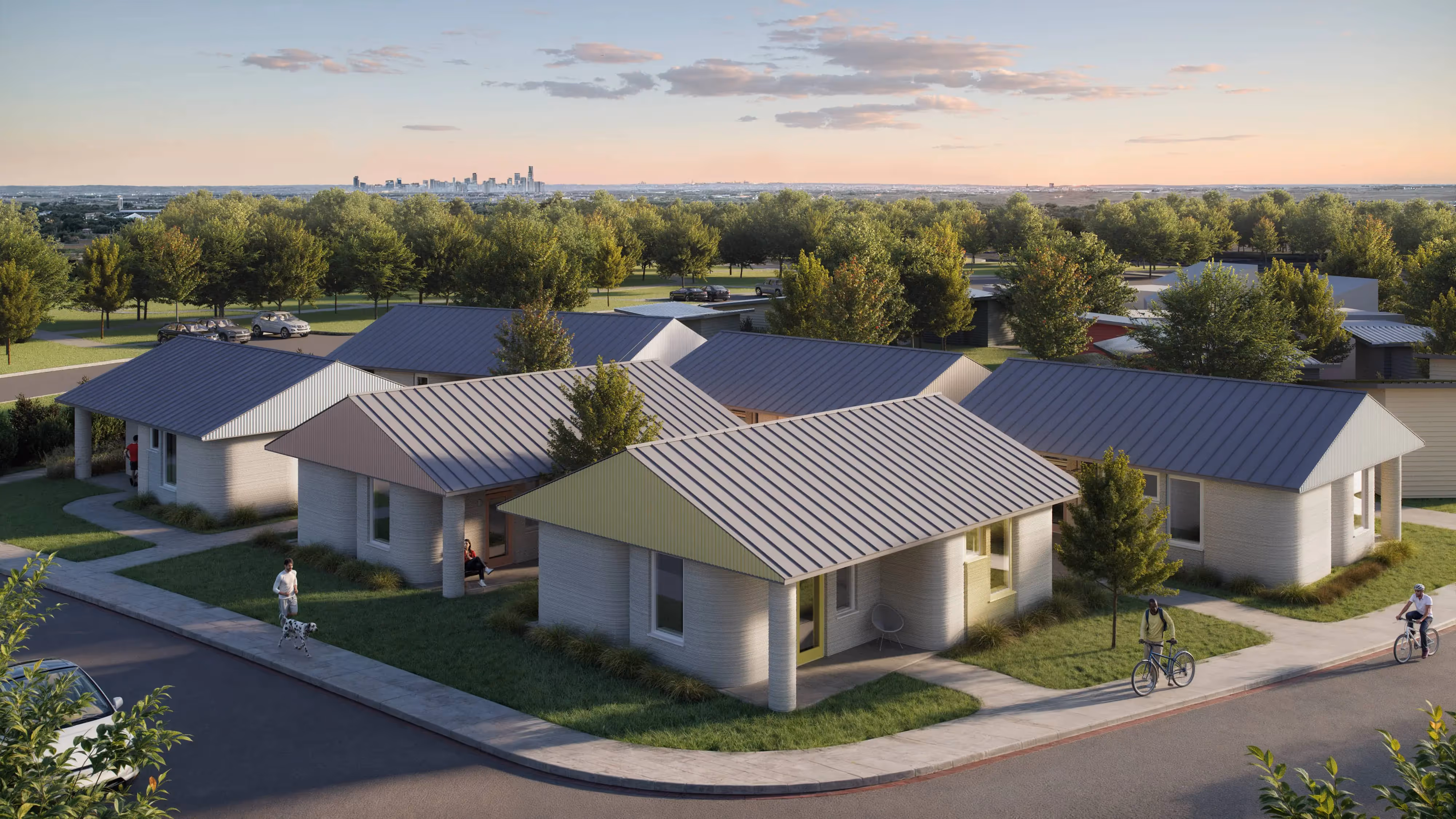 Cluster of single-story 3D-printed homes in a landscaped, walkable community highlighting construction technology