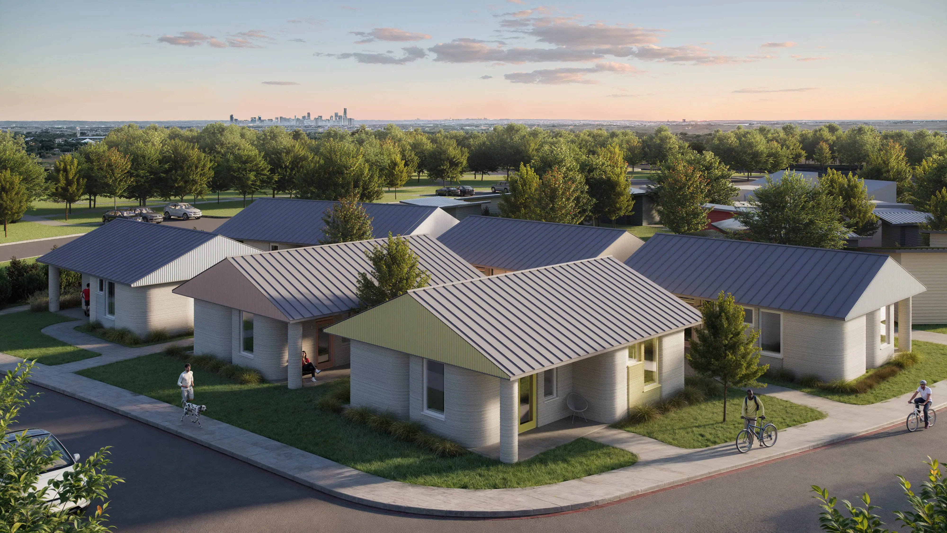 Cluster of single-story 3D-printed homes in a landscaped, walkable community highlighting construction technology