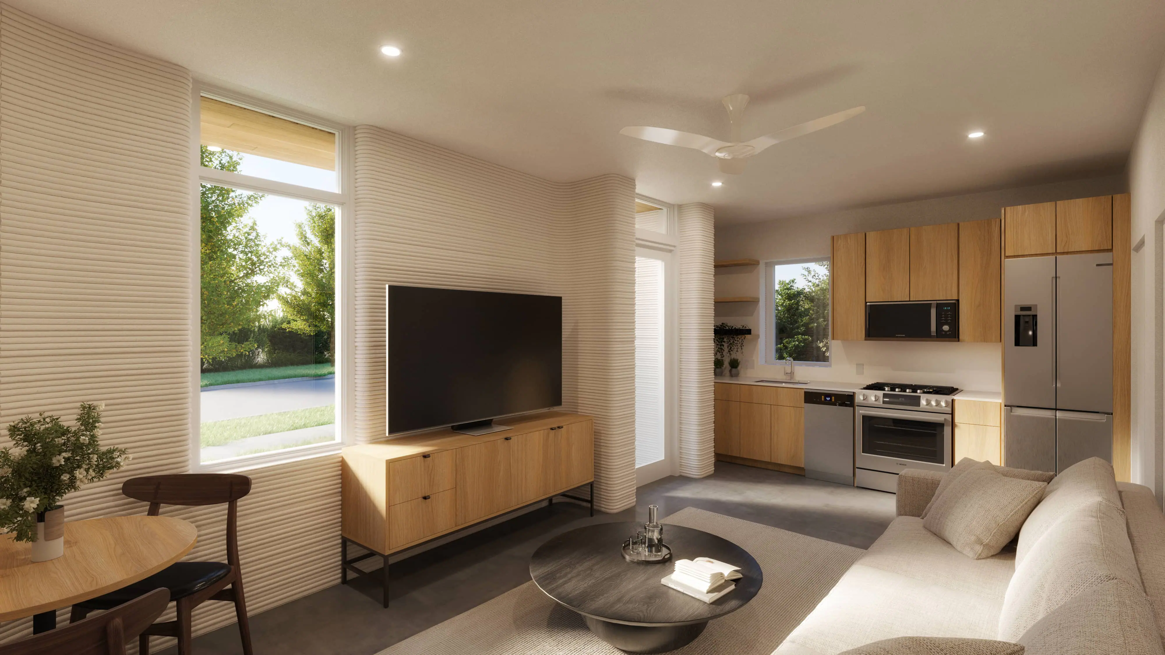 Open-plan living and kitchen with curved ribbed 3D-printed walls, wood cabinets, stainless appliances, and sofa