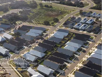 Aerial view of a suburban housing development illustrating the scale of the U.S. housing shortage