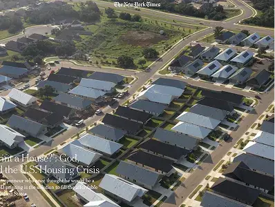 Aerial view of a suburban housing development illustrating the scale of the U.S. housing shortage