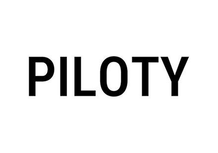 Le texte noir PILOTY sur fond blanc.