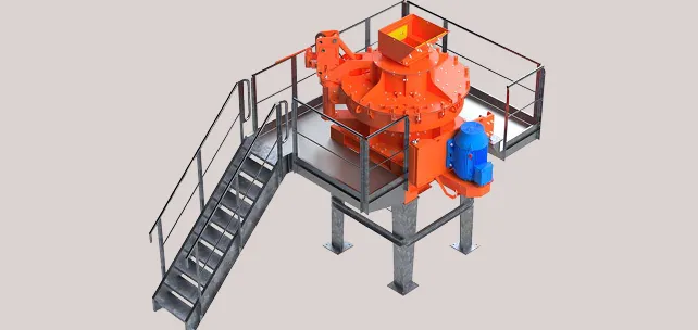 Machine industrielle orange avec des escaliers, une plateforme et un moteur bleu sur des pieds de support métalliques.